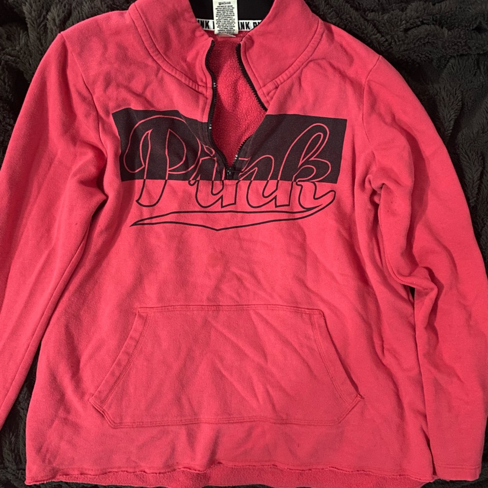 Pink sweater size large.